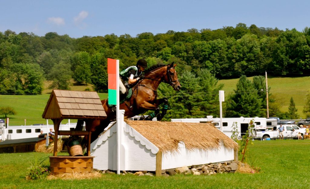 Sara Pyne '13 is shown here skillfully completing the cross-country phase in competition.  
